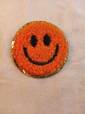 Iron on orange smiley face chenille patch